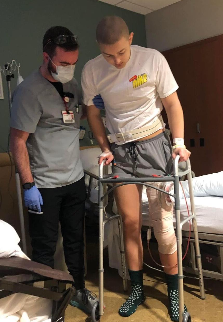 Brycen Doughty, 17, uses walker after surgery to remove cancerous tumor